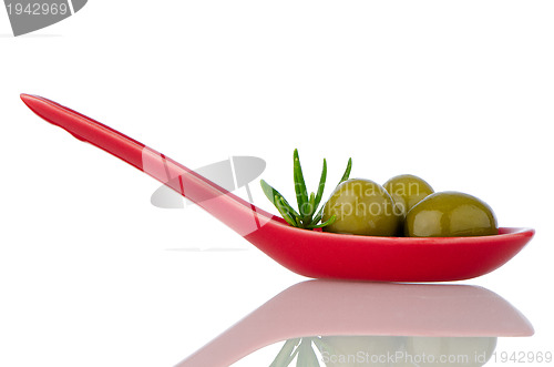 Image of Olives on ceramic spoon