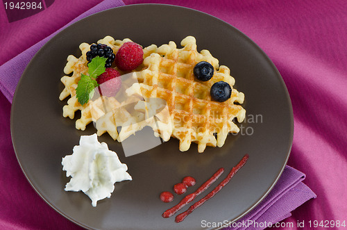 Image of Tasty waffle with fruits 