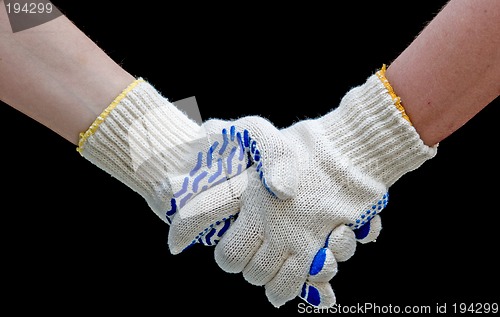 Image of Labor handshake with safety gloves isolated on black