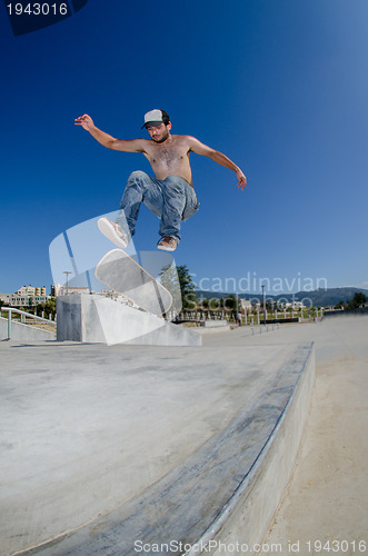 Image of Skateboarder on a flip trick