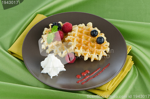 Image of Tasty waffle with fruits 
