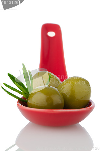 Image of Olives on ceramic spoon