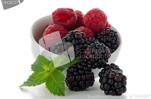 Image of Red fruits in White bowl