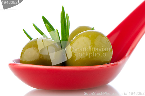 Image of Olives on ceramic spoon