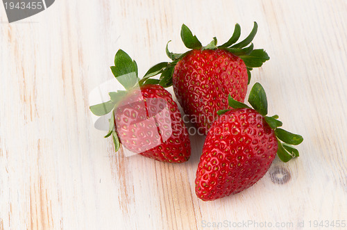 Image of Three fresh strawberries