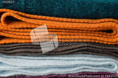 Image of Pile of colorful scarves