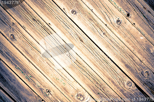 Image of Weathered wooden door texture background 