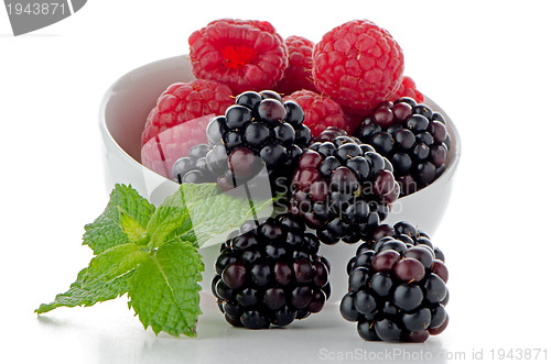 Image of Red fruits in White bowl
