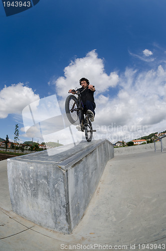 Image of Bmx rider on a ramp 