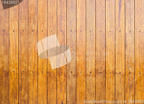 Image of Weathered wooden door texture background 