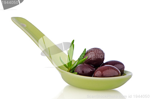 Image of Olives on ceramic spoon