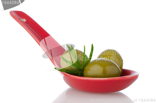 Image of Olives on ceramic spoon