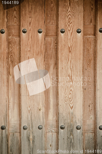 Image of Weathered wooden door texture background 