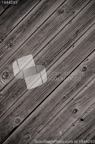 Image of Weathered wooden door texture background 