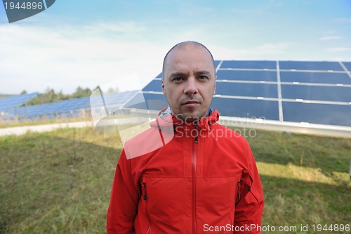 Image of Male solar panel engineer at work place