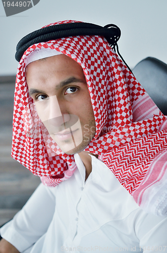 Image of arab business man at bright office