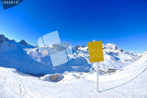 Image of Sign board at High mountains under snow in the winter