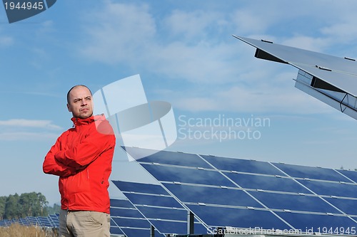 Image of Male solar panel engineer at work place