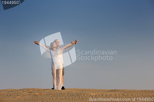 Image of couple enjoying the sunset