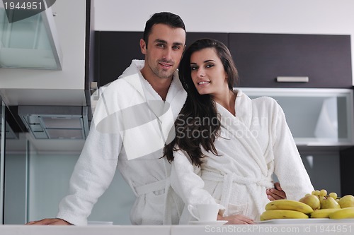 Image of young couple have fun in modern kitchen