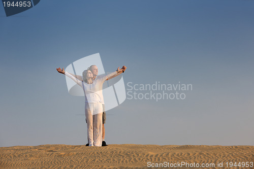 Image of couple enjoying the sunset