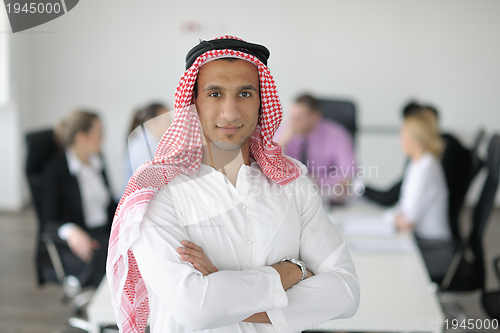 Image of Arabic business man at meeting