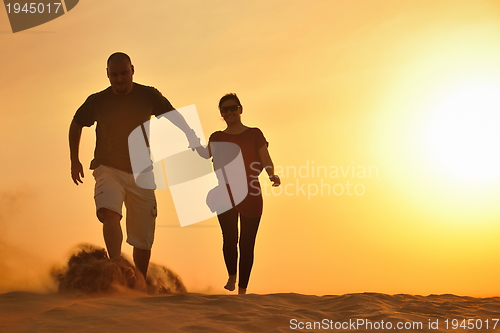 Image of couple enjoying the sunset