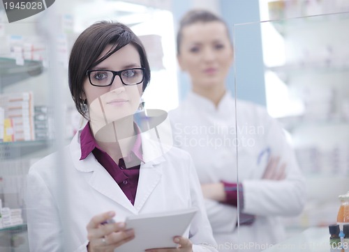 Image of team of pharmacist chemist woman  in pharmacy drugstore