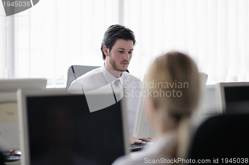 Image of business people group working in customer and help desk office