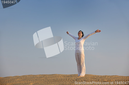 Image of woman relax in desert