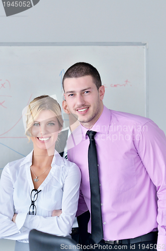 Image of Group of young business people at meeting