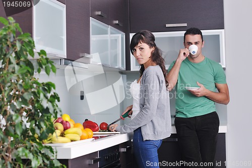 Image of young couple have fun in modern kitchen