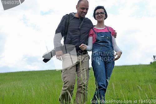 Image of romantic young couple in love together outdoor