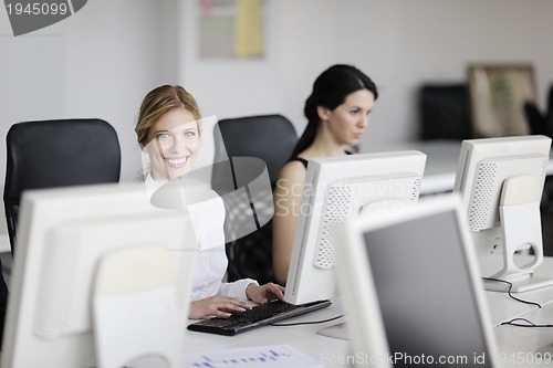 Image of business people group working in customer and help desk office