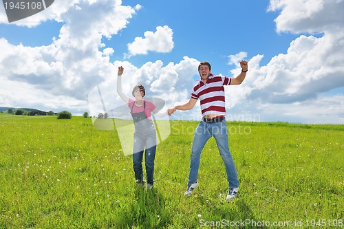 Image of romantic young couple in love together outdoor