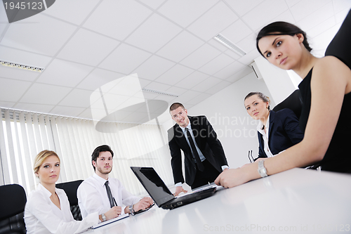 Image of business people in a meeting at office