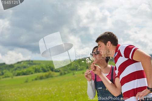 Image of romantic young couple in love together outdoor