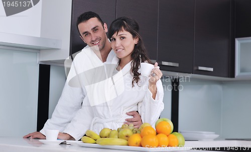 Image of young couple have fun in modern kitchen