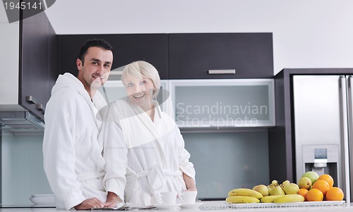 Image of young couple have fun in modern kitchen