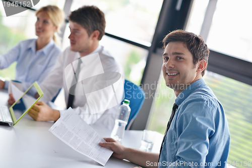 Image of business people in a meeting at office