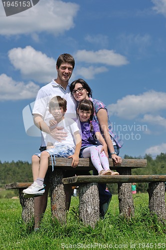 Image of happy young family have fun outdoors