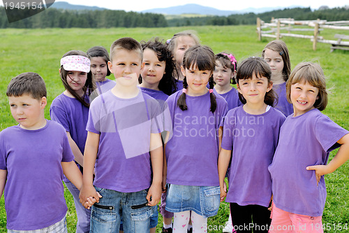 Image of happy kids group  have fun in nature