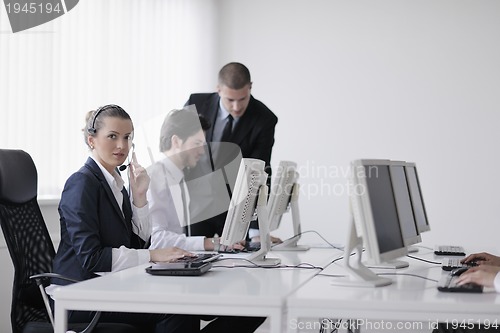 Image of business people group working in customer and help desk office