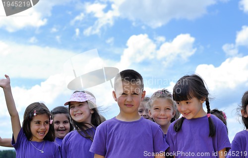 Image of happy kids group  have fun in nature