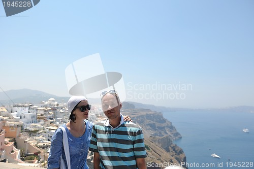 Image of happy young couple tourists in greece