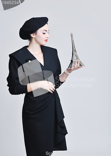 Image of beautiful young woman with paris symbol eiffel tower