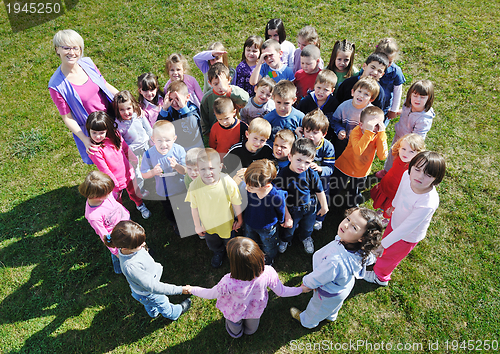 Image of preschool  kids outdoor have fun