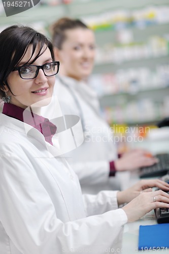 Image of team of pharmacist chemist woman  in pharmacy drugstore