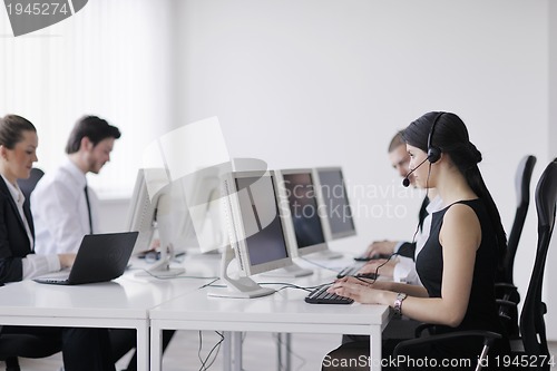 Image of business people group working in customer and help desk office