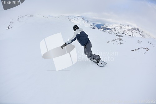 Image of skiing on fresh snow at winter season at beautiful sunny day